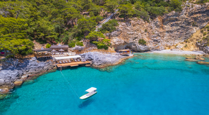 Aerial View of Turquoise Bay and Secluded Cliffside Waterfront Terraces