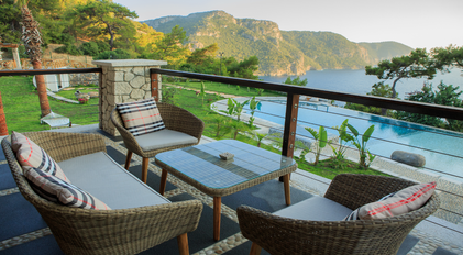 Wicker Terrace Lounge Overlooking the Mediterranean at Gokce Gemile Estate