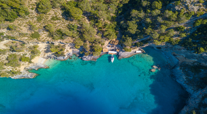 Aerial Panorama of a Hidden Peninsula Bay with Turquoise Water and Private Jetty
