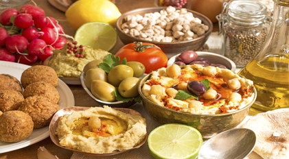 Private chef mezze preparation featuring Mediterranean ingredients and handcrafted dishes