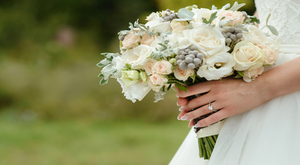 Elegant bridal bouquet captured in soft natural light on a Mediterranean peninsula
