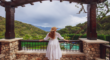 Quiet wellness moment overlooking mountains and a secluded pool terrace