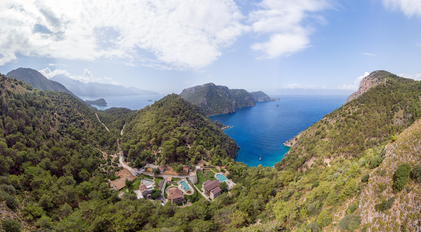 Ultra-wide aerial panorama of the Mediterranean peninsula embracing the estate