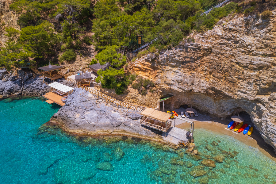 Aerial View of Cliffside Waterfront Platforms on a Secluded Mediterranean Bay
