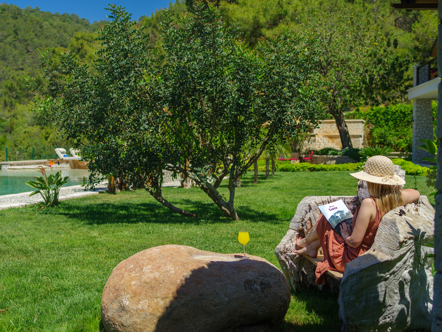 Nature-Integrated Garden Relaxation Scene within a Private Peninsula Estate