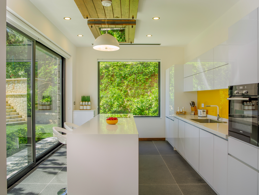 Bright modern kitchen with garden views at Villa Gökçe
